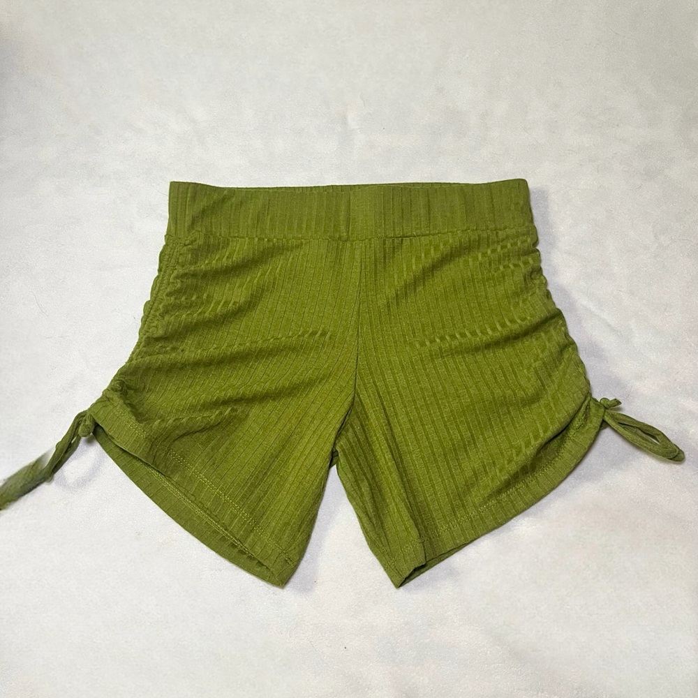 Green tight adjustable length shorts